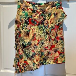 Nanette Lepore floral skirt w red silk lining. Size 0.
